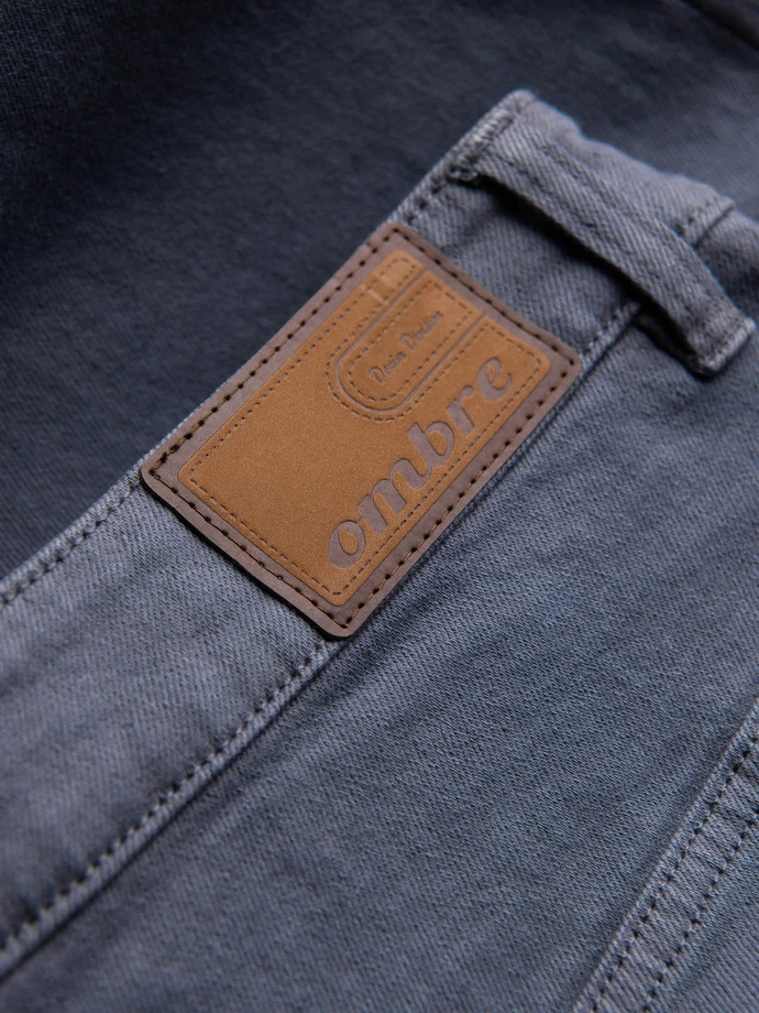 Pánské džínové kalhoty bez oděru SLIM FIT - tmavě modré V4 OM-PADP-0148